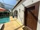 Inviting backyard pool in an enclosed area with a side door for easy access at 5554 Riva Ridge Dr, Wesley Chapel, FL 33544
