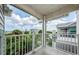 This beautiful balcony offers stunning views of the surrounding neighborhood and picturesque skies at 5712 Biscayne Ct # 205, New Port Richey, FL 34652