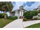 Exterior view of a building with a walkway and stairs leading to the entrance at 5712 Biscayne Ct # 205, New Port Richey, FL 34652