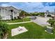 Community lawn and picnic area near the parking lot at 5712 Biscayne Ct # 205, New Port Richey, FL 34652