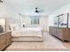 Bright bedroom featuring neutral tones, lots of natural light, and wood-look flooring at 6310 95Th E St, Bradenton, FL 34202