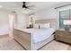 Bright bedroom featuring neutral tones, lots of natural light, and wood-look flooring at 6310 95Th E St, Bradenton, FL 34202