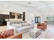 This open floorplan features a spacious living room and a gourmet kitchen with a large island at 6310 95Th E St, Bradenton, FL 34202