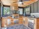 Outdoor kitchen with built-in grill, prep area, and stainless steel beverage center at 6310 95Th E St, Bradenton, FL 34202