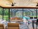 Inviting covered patio overlooking a sparkling pool and lush backyard at 6310 95Th E St, Bradenton, FL 34202