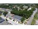Aerial view of a community featuring townhomes with well maintained landscaping and a parking space at 6617 Citrus Creek Ln, Tampa, FL 33625