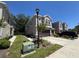 A charming two-story home showcasing manicured landscaping and a spacious driveway at 6617 Citrus Creek Ln, Tampa, FL 33625