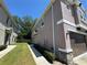 A well-maintained exterior shows stone accents, a garage, and a green lawn at 6617 Citrus Creek Ln, Tampa, FL 33625