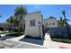 Community building exterior with palm trees, accessible parking, and building signage at 6617 Citrus Creek Ln, Tampa, FL 33625