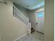 Foyer with tile flooring and a staircase leading to the upper level of the home at 6617 Citrus Creek Ln, Tampa, FL 33625