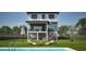 Spacious backyard with a pool, lounge chairs, an umbrella, and a covered patio area for relaxation at 721 Mandalay Ave, Clearwater Beach, FL 33767