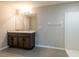 Bathroom features a double vanity, neutral color palette, and a separate shower at 7486 Tuscan Bay Cir, Wesley Chapel, FL 33545