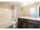 Bathroom featuring double sinks and a shower and bathtub combination at 7486 Tuscan Bay Cir, Wesley Chapel, FL 33545