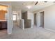 Upstairs hallway with neutral paint, carpet flooring, and connecting doorways to other rooms at 7486 Tuscan Bay Cir, Wesley Chapel, FL 33545