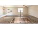 Modern kitchen featuring stainless steel sink and a view of the living room and backyard at 7486 Tuscan Bay Cir, Wesley Chapel, FL 33545
