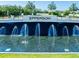 Epperson lagoon entry featuring fountains and landscaping at 7486 Tuscan Bay Cir, Wesley Chapel, FL 33545
