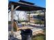 Outdoor gazebo with comfortable seating and a view of the pool area at 7503 N Howard Ave, Tampa, FL 33604