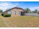 Backyard with a patio and a privacy fence that surrounds the property at 8704 Sandy Plains Dr, Riverview, FL 33578