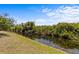 This property backs to a canal and natural preserve, perfect for enjoying nature at 8704 Sandy Plains Dr, Riverview, FL 33578