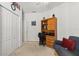 Office with a desk, futon, closet, and ample space at 8704 Sandy Plains Dr, Riverview, FL 33578
