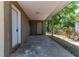 Covered back porch with view of backyard at 907 Tyner St, Plant City, FL 33563