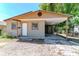 Front exterior showcasing a one-story home with a carport providing covered parking at 907 Tyner St, Plant City, FL 33563