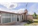 Back view of home with patio and shed at 9205 Ledgestone Ln, Port Richey, FL 34668