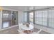 The lanai offers views of the backyard and a sliding glass door leading into the main living space at 9205 Ledgestone Ln, Port Richey, FL 34668