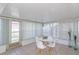 Bright lanai with views of the backyard, perfect for enjoying the outdoors at 9205 Ledgestone Ln, Port Richey, FL 34668
