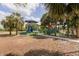 Image shows a colorful playground and park at 9205 Ledgestone Ln, Port Richey, FL 34668