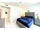 Elegant bedroom with plush bedding, soft lighting, and modern design elements at 9650 Lake Chase Island Way # 9650, Tampa, FL 33626