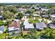 Aerial view of a landscaped property, showcasing a well-maintained lawn at 10828 99Th Pl, Seminole, FL 33772