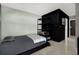 Bedroom with a single bed and black shelving at 10828 99Th Pl, Seminole, FL 33772