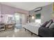 Bright bedroom featuring light purple walls, natural light, and modern vanity at 10828 99Th Pl, Seminole, FL 33772