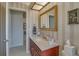 A vintage bathroom with unique decor and vanity sink at 1104 Northridge Dr, Palm Harbor, FL 34683