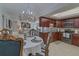 Eat-in kitchen and view of the living area, perfect for entertaining guests and Gathering meals at 1104 Northridge Dr, Palm Harbor, FL 34683