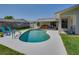 Backyard pool with patio area and seating at 1104 Northridge Dr, Palm Harbor, FL 34683