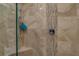 The shower in the primary bathroom has tile walls and a glass door at 1104 Northridge Dr, Palm Harbor, FL 34683