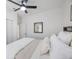 Cozy bedroom featuring neutral bedding and an open layout at 1110 36Th N Ave, St Petersburg, FL 33704