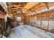 Exposed rafters add character to this unfinished garage space with a concrete floor at 1110 36Th N Ave, St Petersburg, FL 33704
