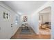 Inviting foyer with a charming workspace, showcasing natural light and a glimpse into the cozy living area at 1110 36Th N Ave, St Petersburg, FL 33704