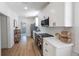 Kitchen featuring stainless appliances, white cabinetry, and neutral countertops at 1110 36Th N Ave, St Petersburg, FL 33704