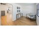 Open-concept living area with hardwood floors and ample natural light, creating a warm and inviting atmosphere at 1110 36Th N Ave, St Petersburg, FL 33704