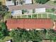Aerial view of a condo complex featuring well-maintained landscaping and assigned carport parking at 11511 113Th St # 35E, Largo, FL 33778
