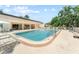 Inviting community pool with ample lounge chairs for residents to relax and unwind at 11511 113Th St # 35E, Largo, FL 33778