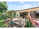Private patio with garden landscaping, outdoor seating, providing a relaxing retreat at 11511 113Th St # 35E, Largo, FL 33778