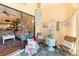Bright sunroom features outdoor views, coastal decor, and comfortable seating for relaxing at 11511 113Th St # 35E, Largo, FL 33778