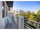 Comfortable outdoor balcony with seating overlooking the community at 1182 25Th N Way, St Petersburg, FL 33713