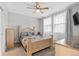 Bright bedroom featuring a ceiling fan, natural light, and neutral-toned decor, creating a cozy and inviting atmosphere at 1182 25Th N Way, St Petersburg, FL 33713