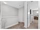 Hallway with neutral carpet leading to other rooms in the home at 1182 25Th N Way, St Petersburg, FL 33713